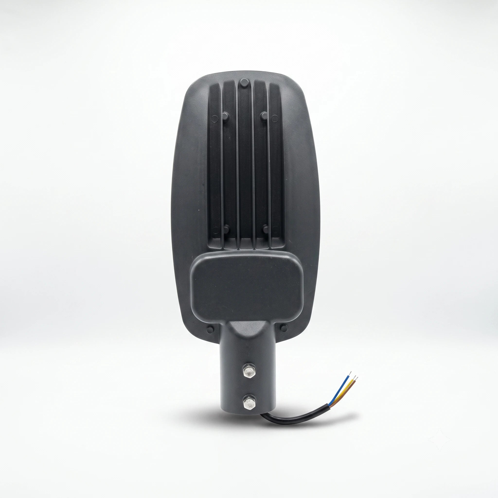 A black rectangular outdoor LED street light fixture with a ribbed housing, a mounting post, and a three-wire power cable, shown against a light gray studio background.