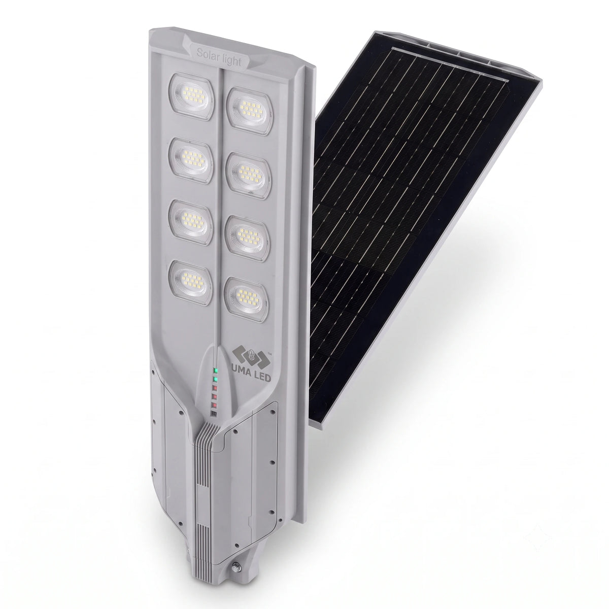 A solar-powered street light shown at an angle with its gray metal housing and twelve LED light modules on one side, and a black solar panel attached on the other, set against a plain white background.