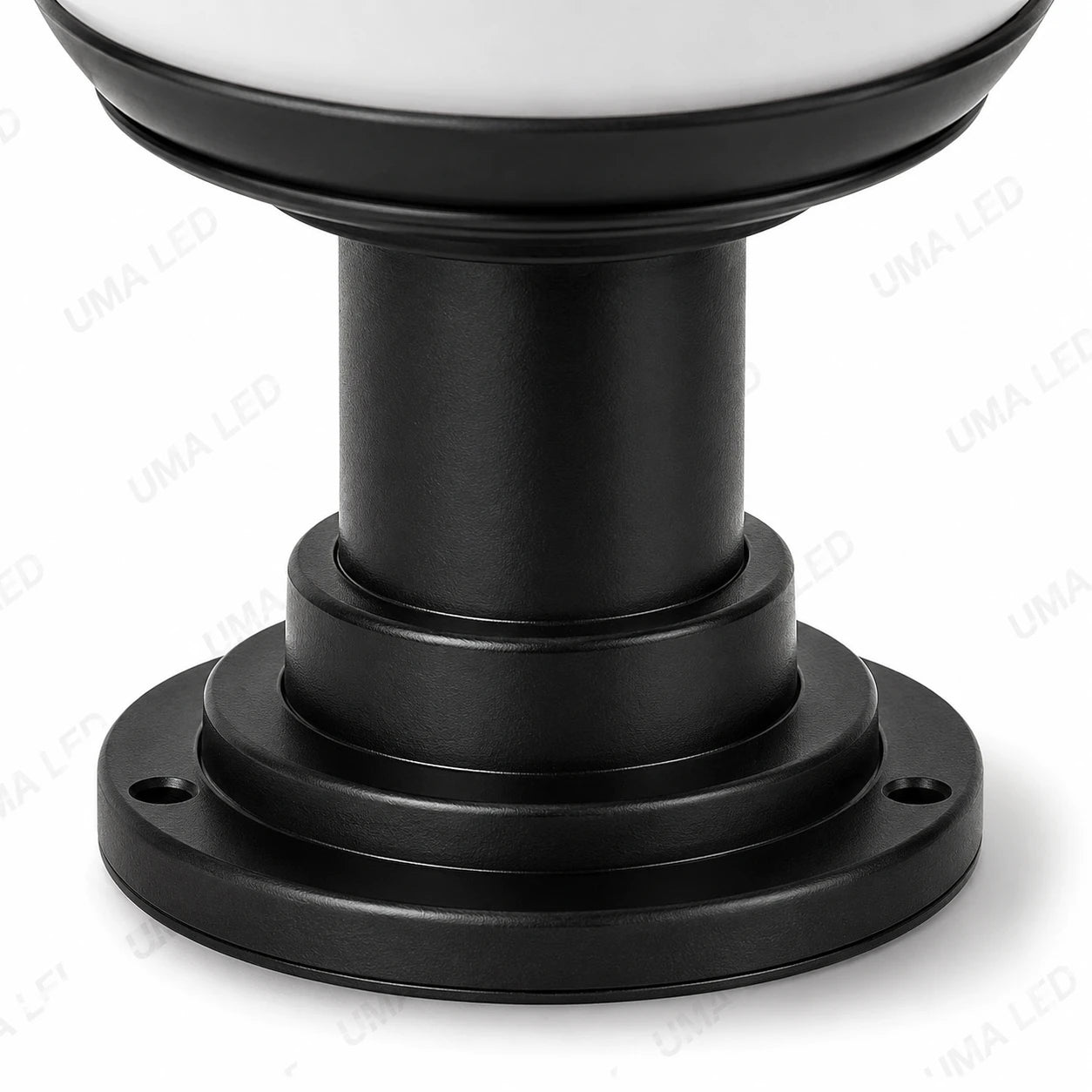 Close-up of a black metal lamp post base with a circular mounting flange and a white globe shade visible at the top, shown on a white background with faint UMA LED watermarks.