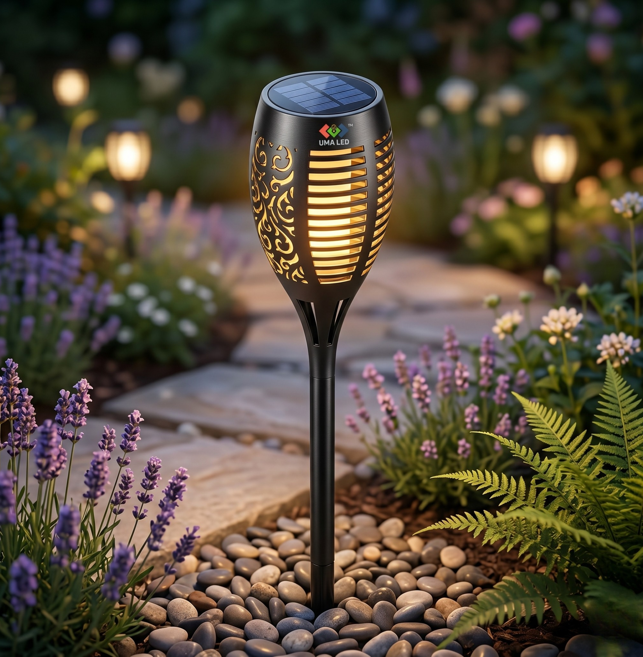 Solar garden light in a garden setting with flowers and stones.