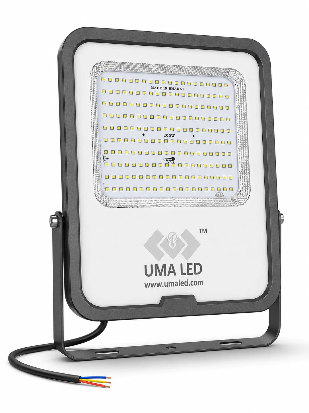 UMA LED floodlight with a black metal housing and mounting bracket, featuring a white front plate with the UMA LED logo and a grid of LED chips, with a black cable showing three wire colors at the bottom left, on a white background.