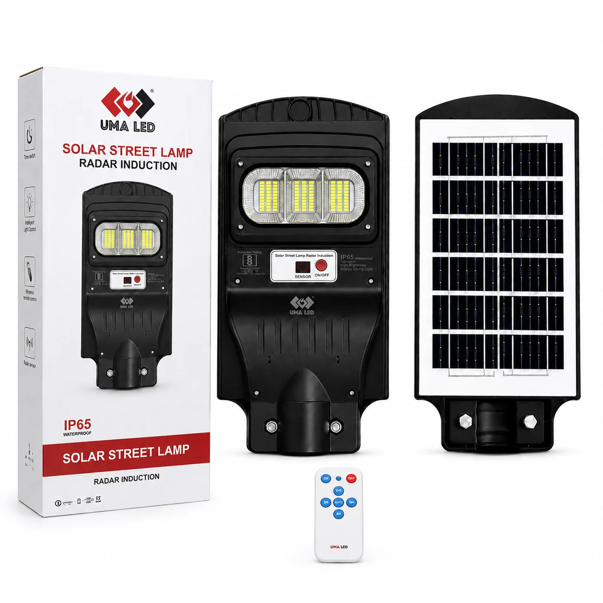 Black solar street lamp with integrated LED light and a separate solar panel, shown alongside its white retail box and a small white remote control on a light gray background. The brand UMA LED is visible on the box, lamp, and remote.